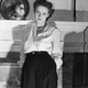 Dickey Chapelle posing in front of the fireplace in her New York City apartment, 1942
(Photo probably taken by Tony Chapelle.)